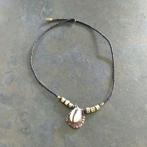 Men's cowrie beaded necklace.